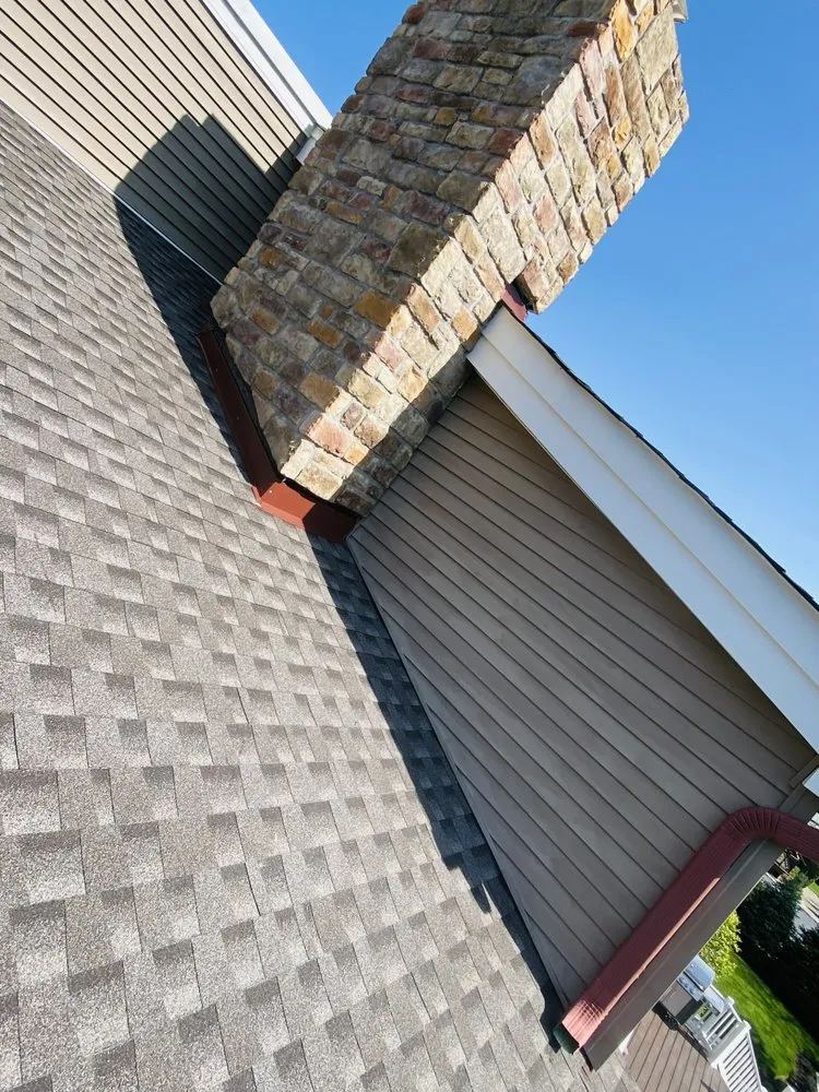 Slide of Zeus Siding & Windows