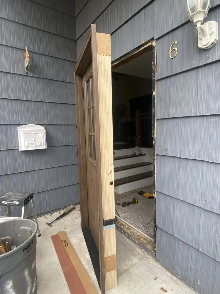 Slide of Zeus Siding & Windows