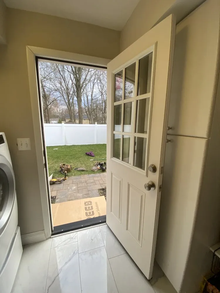 Slide of Zeus Siding & Windows