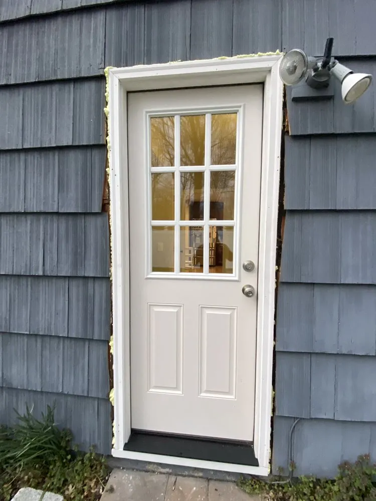 Slide of Zeus Siding & Windows