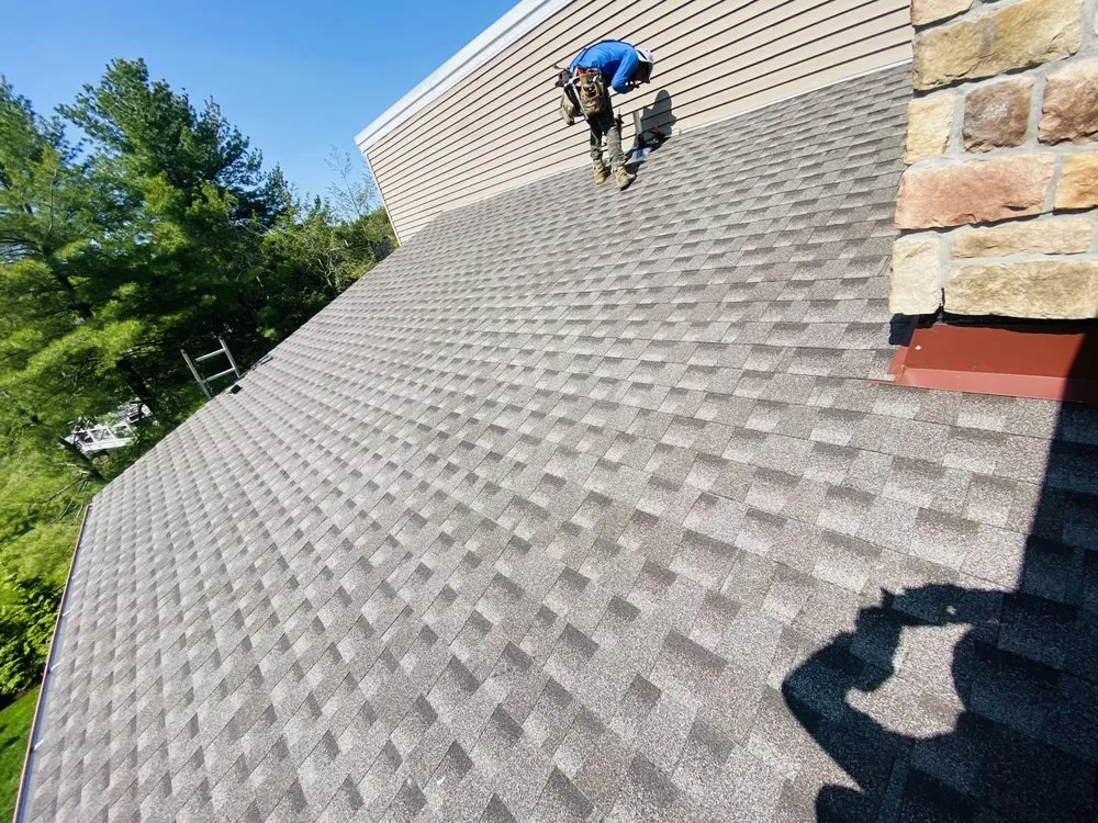 Slide of Zeus Siding & Windows