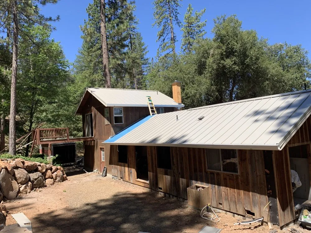 Slide of ZeZee Roofing