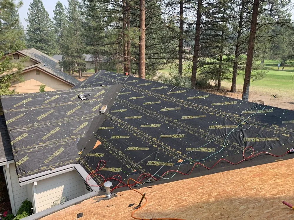 Slide of ZeZee Roofing