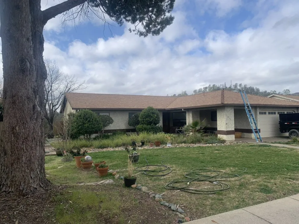 Slide of ZeZee Roofing