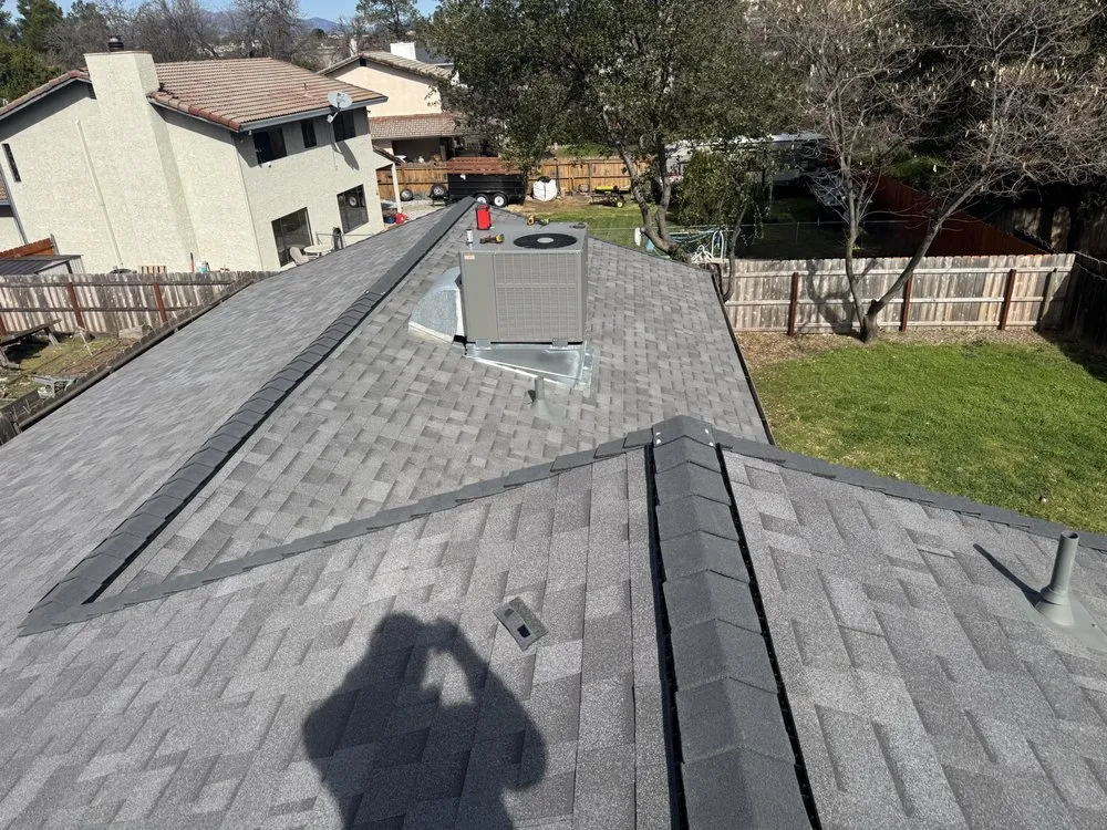 Slide of ZeZee Roofing