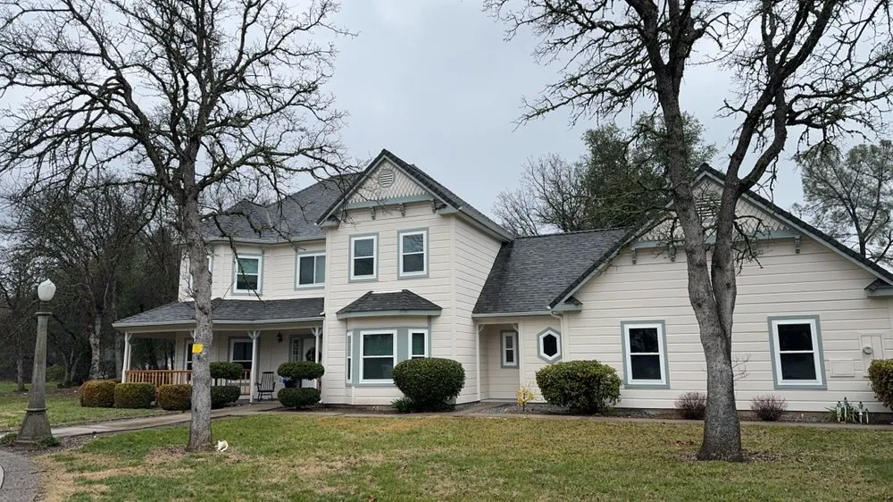 Slide of ZeZee Roofing