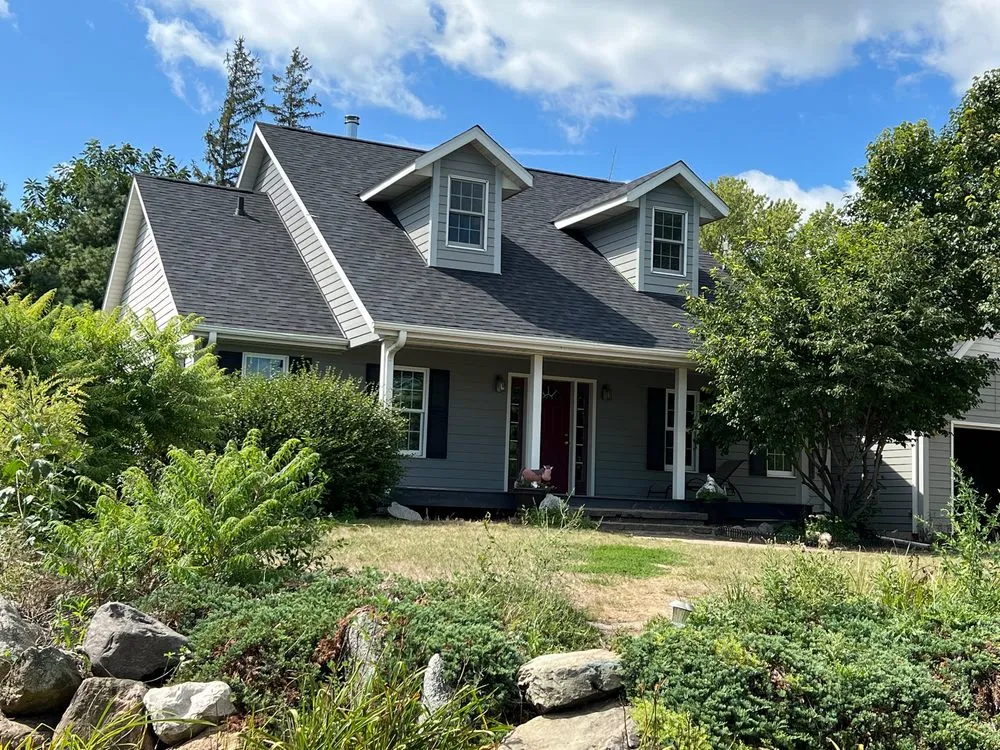 Slide of Zinnel Roofing and Exteriors