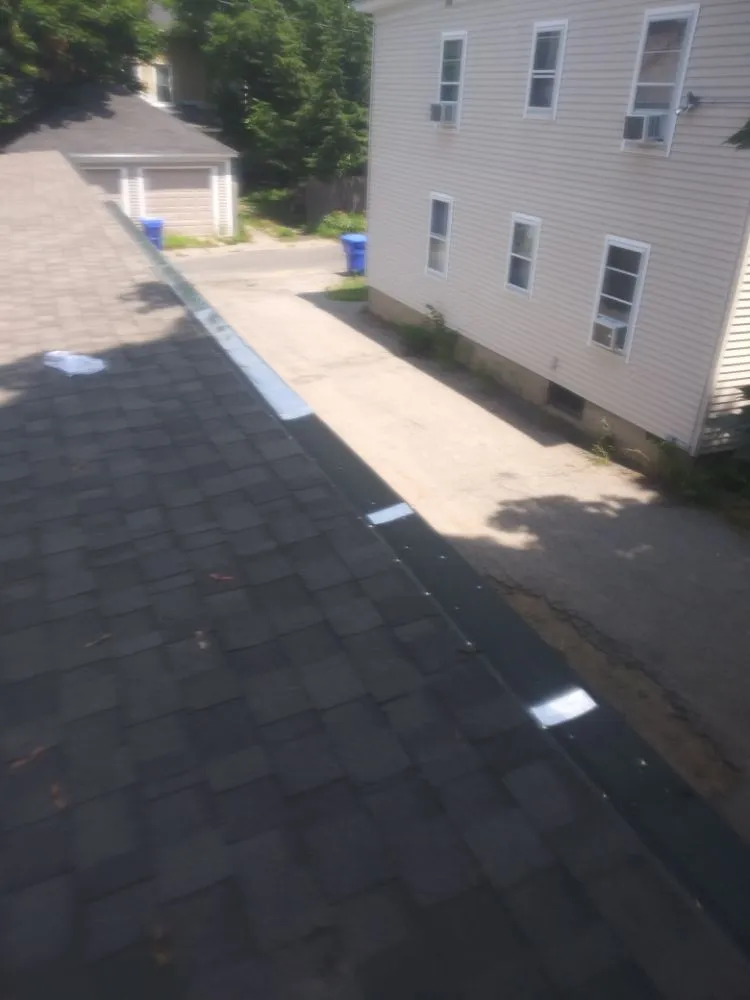 Expert flat roof repair same-day service across Manchester,, NH - Zjw roofing and construction