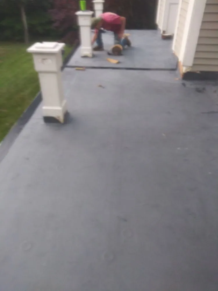 Expert storm damage roof repair same-day service across Manchester,, NH - Zjw roofing and construction