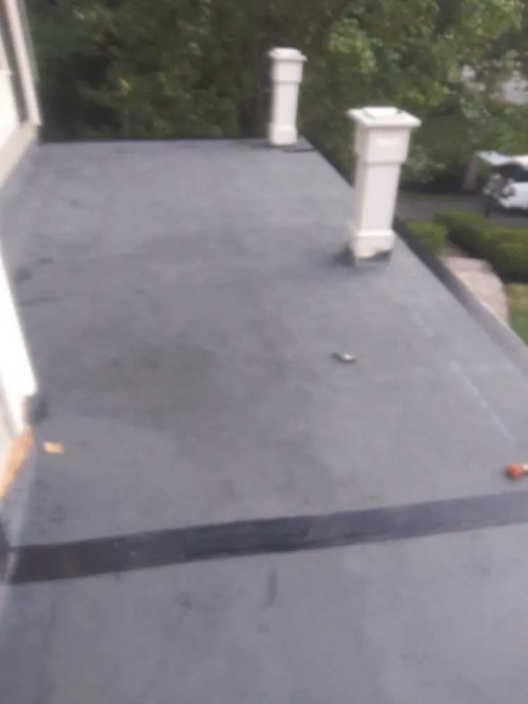 Licensed storm damage roof repair in Manchester,, NH - Zjw roofing and construction
