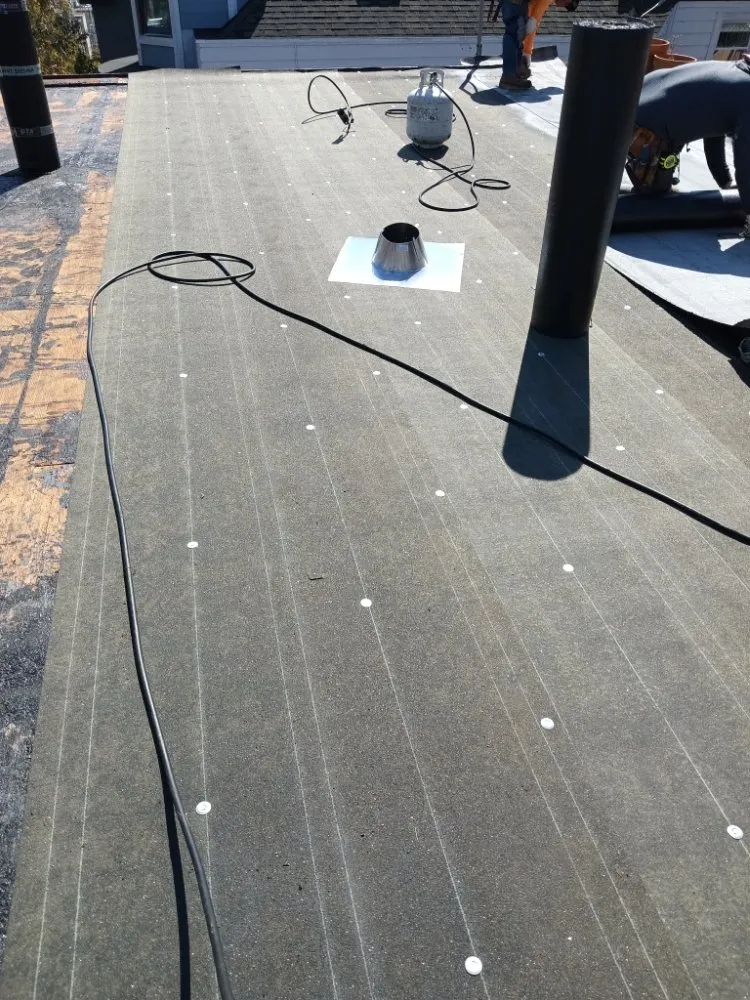 Slide of Zoethi Roofing and Gutters