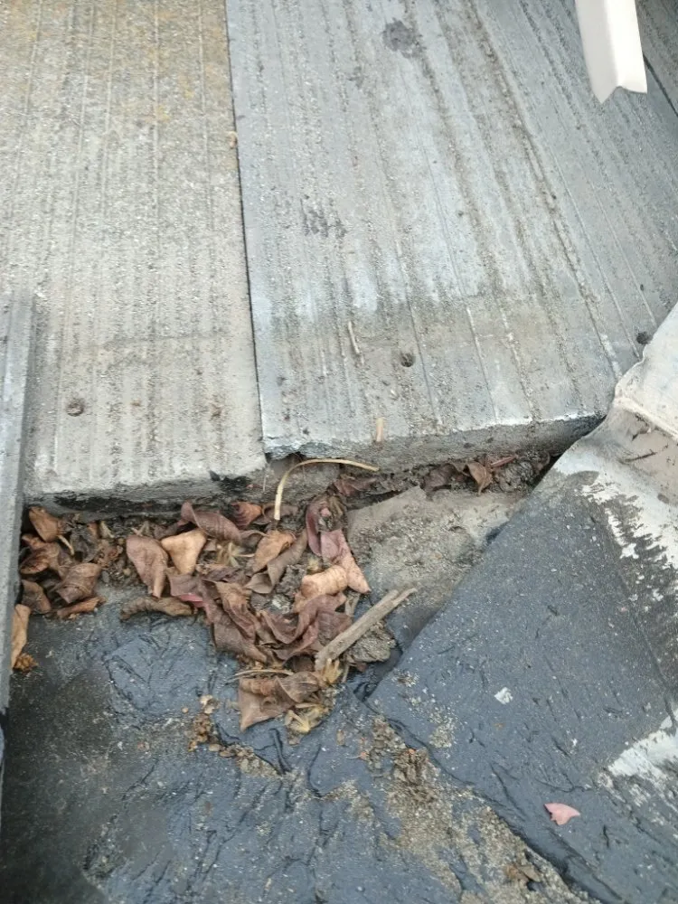 Slide of Zoethi Roofing and Gutters