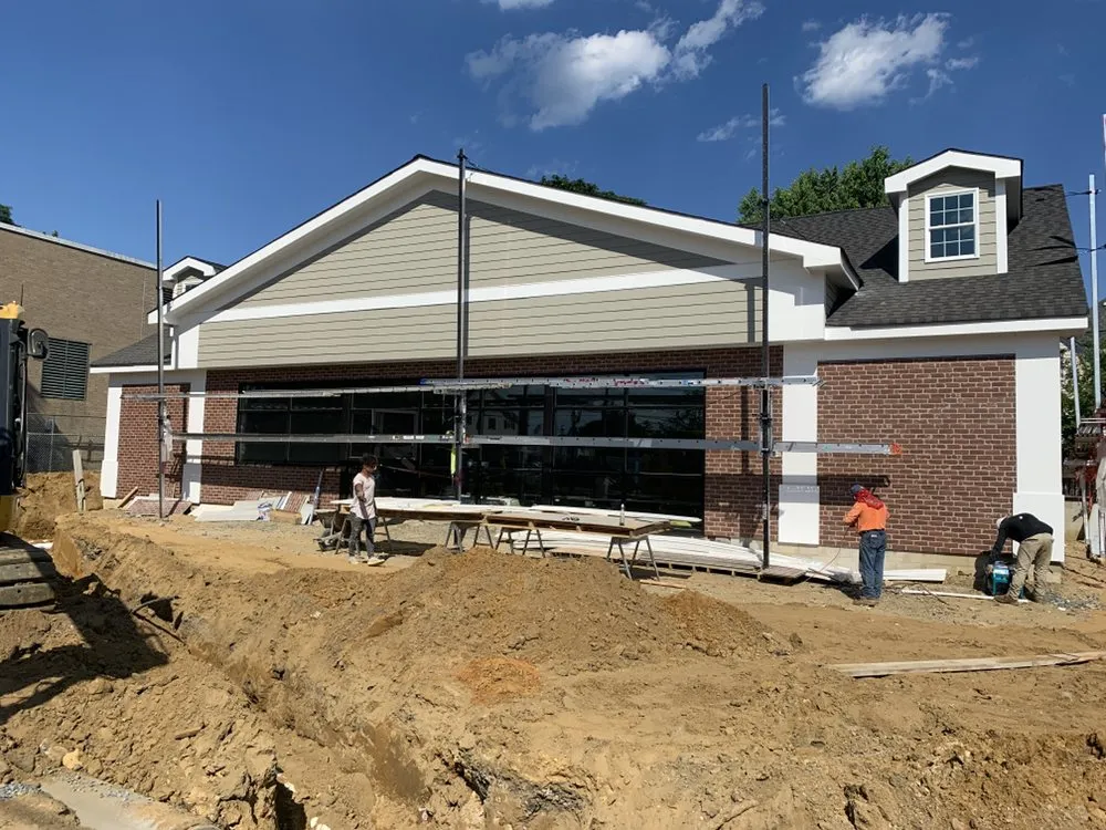 Slide of Zona Roofing