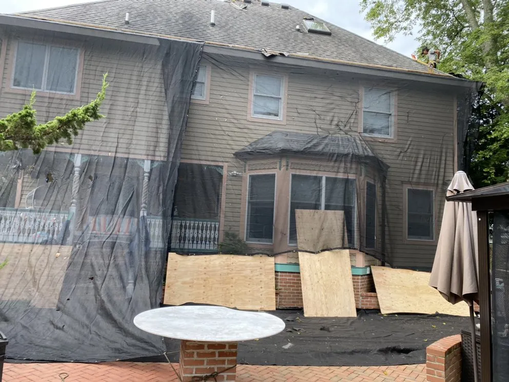 Slide of Zona Roofing