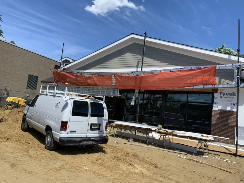 Slide of Zona Roofing