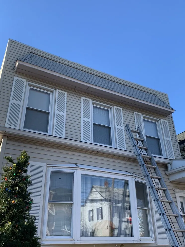 Slide of Zumba Roofing