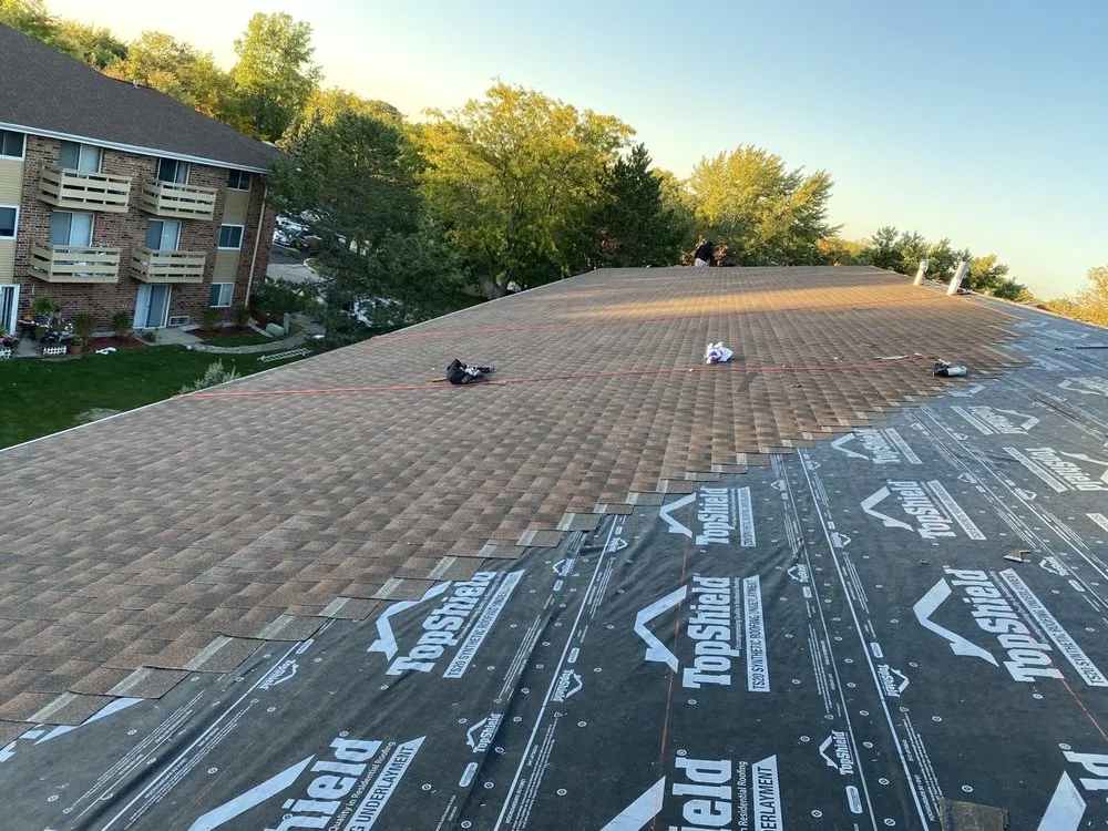 Slide of Zuniga Roofing