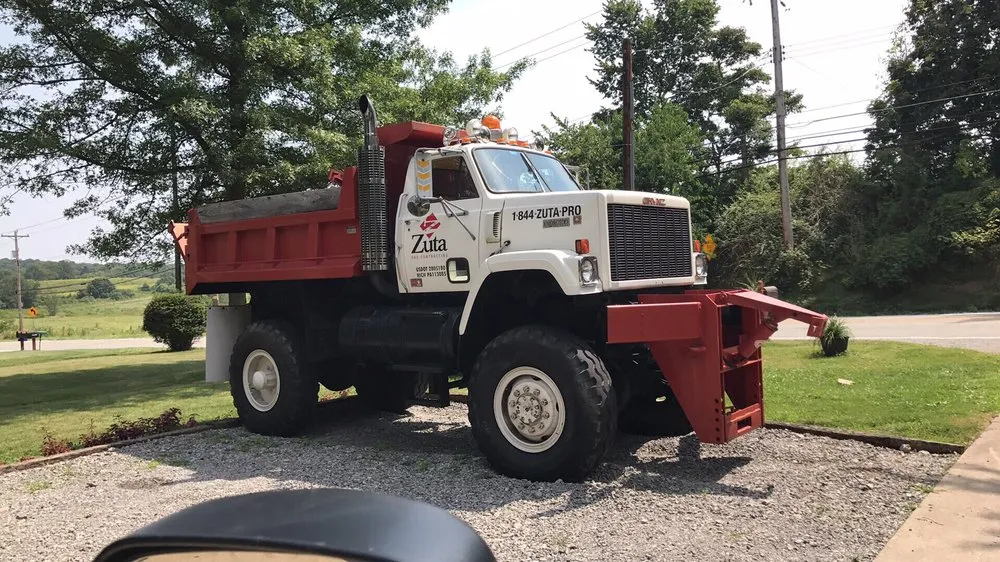 Slide of Zuta Roofing Specialists