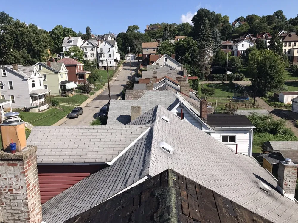 Slide of Zuta Roofing Specialists