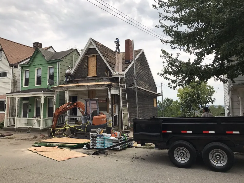 Slide of Zuta Roofing Specialists