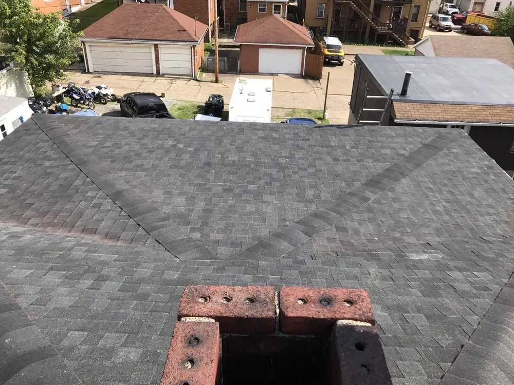 Slide of Zuta Roofing Specialists