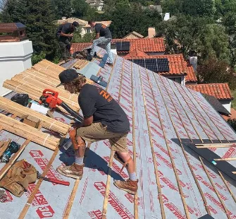 Slide of Zylinksi Roofing